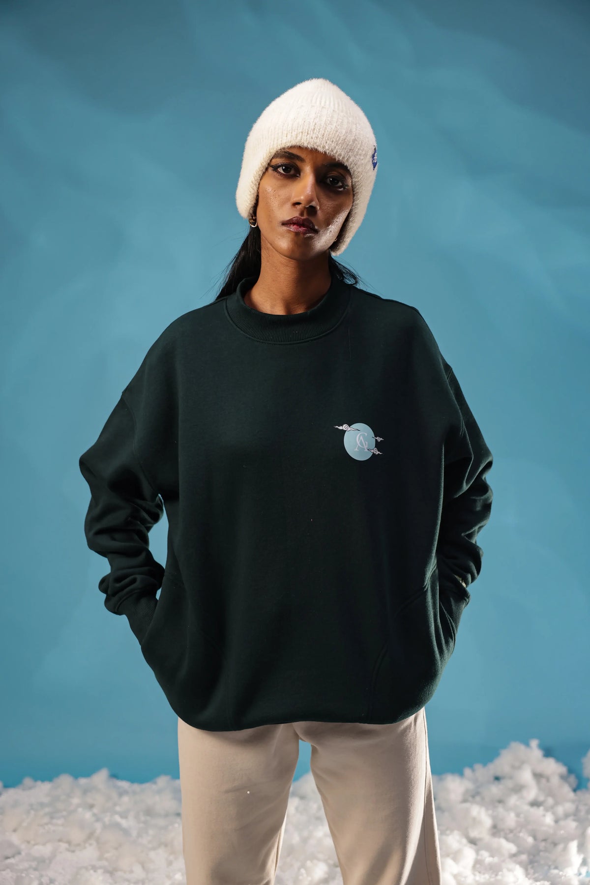 AG Kaibutsu (Unisex): model wearing the dark green sweatshirt, front view