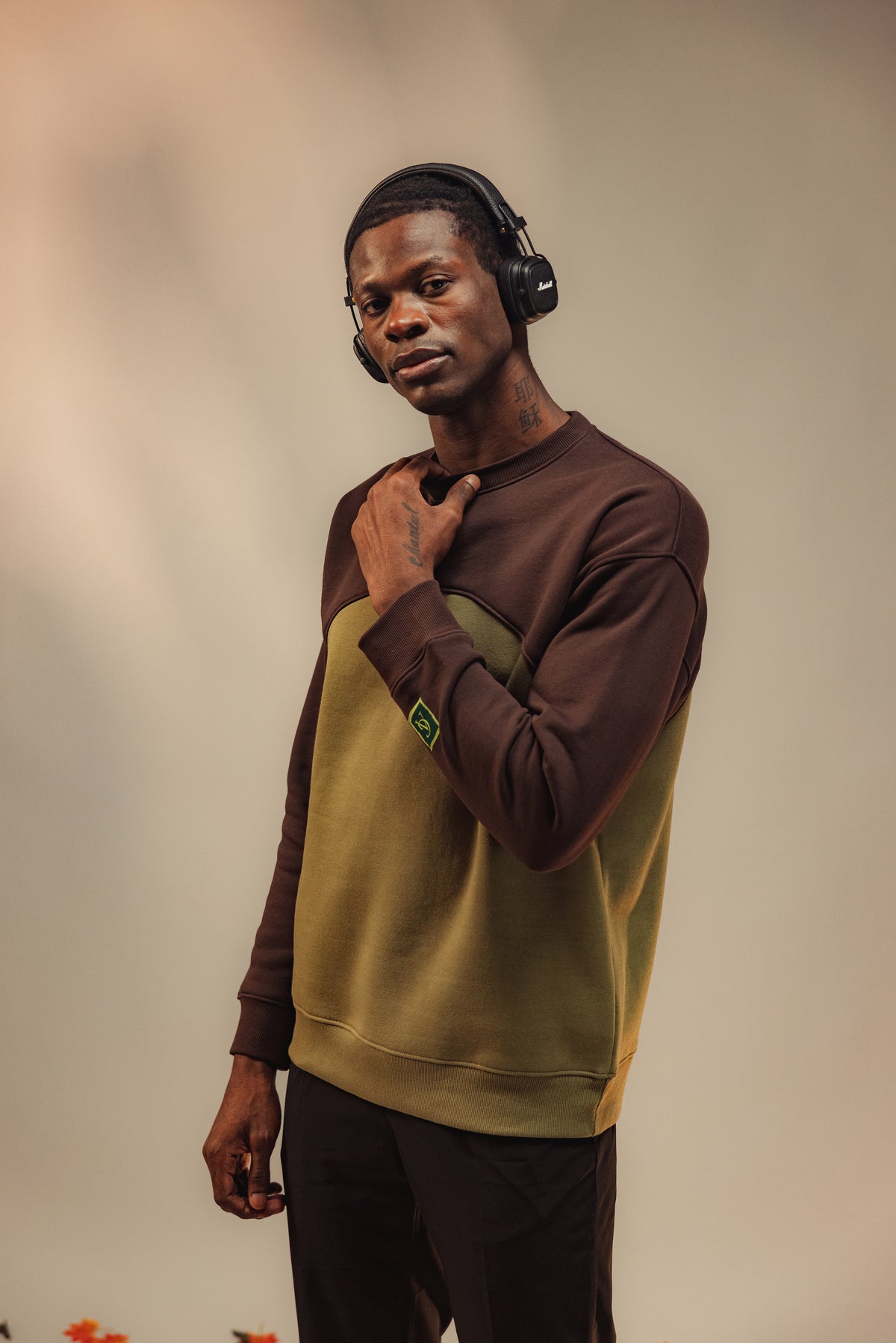 AG Plain (Unisex): model wearing the colour-block sweatshirt, angled front view