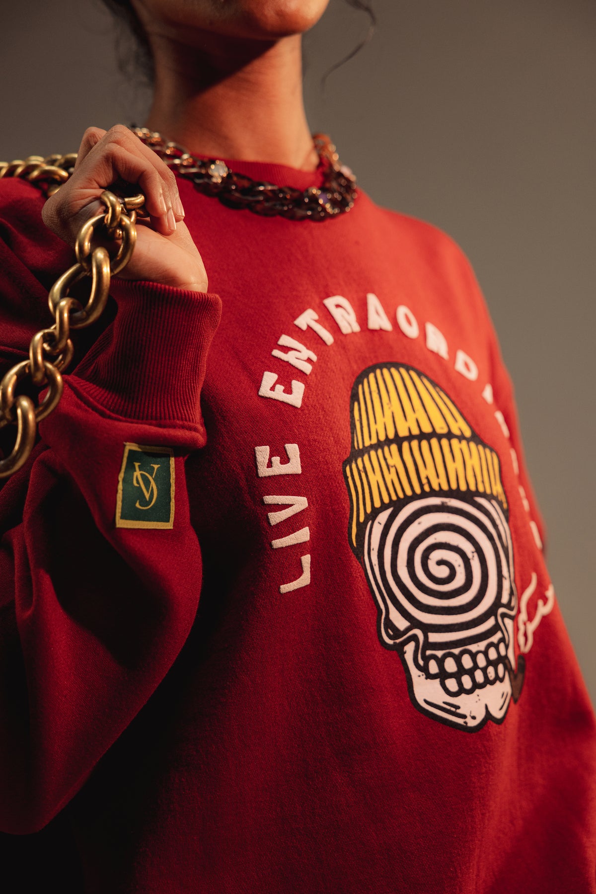 AG Twisted Mind (Unisex): close-up of the spiral face chest graphic
