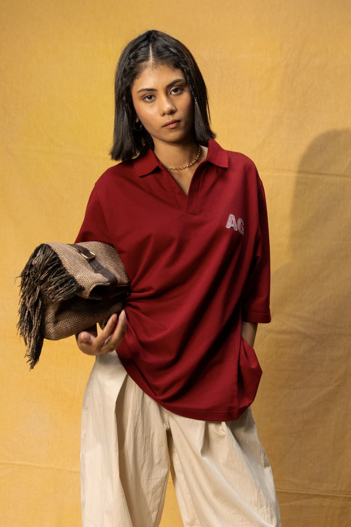 Just AG Lounge Polo (Unisex): model wearing the burgundy polo, front view