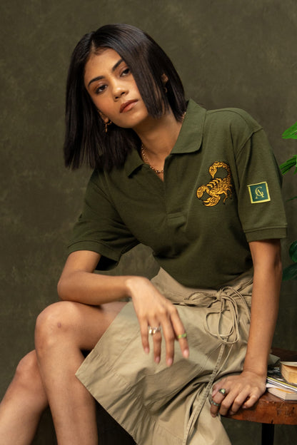 Death Sting Classic Polo (Unisex): model wearing the olive green polo, seated front view