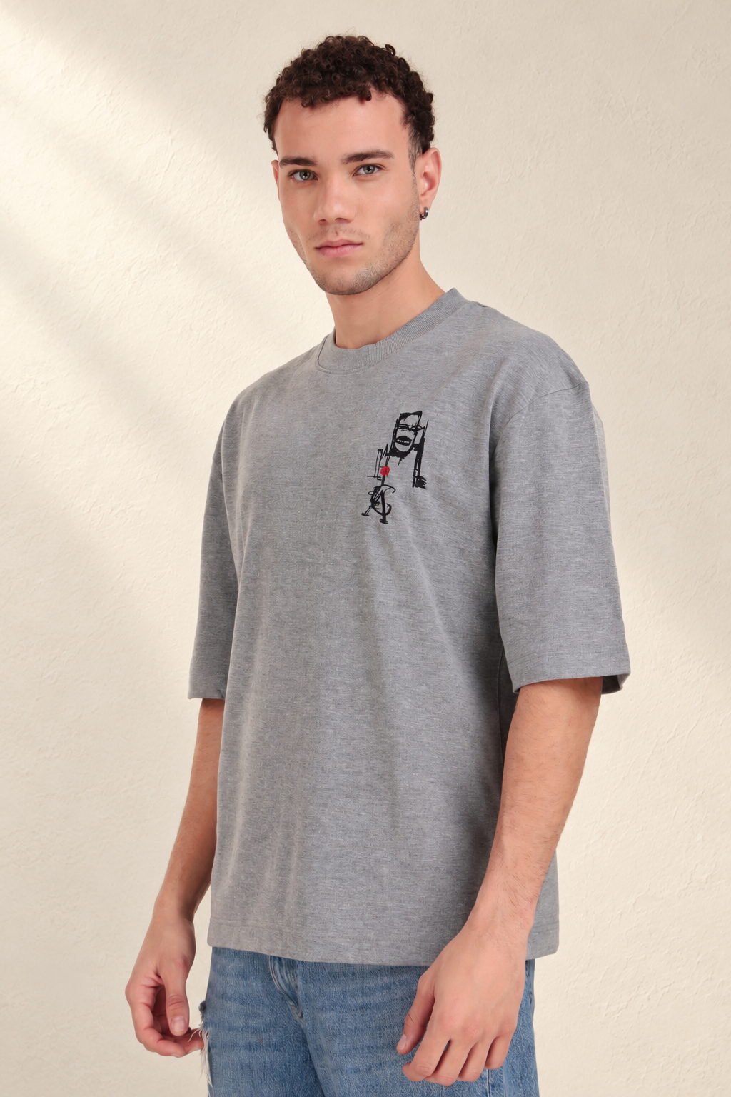 Tribal Masks Lounge T-Shirt: model wearing the grey T-shirt, front view