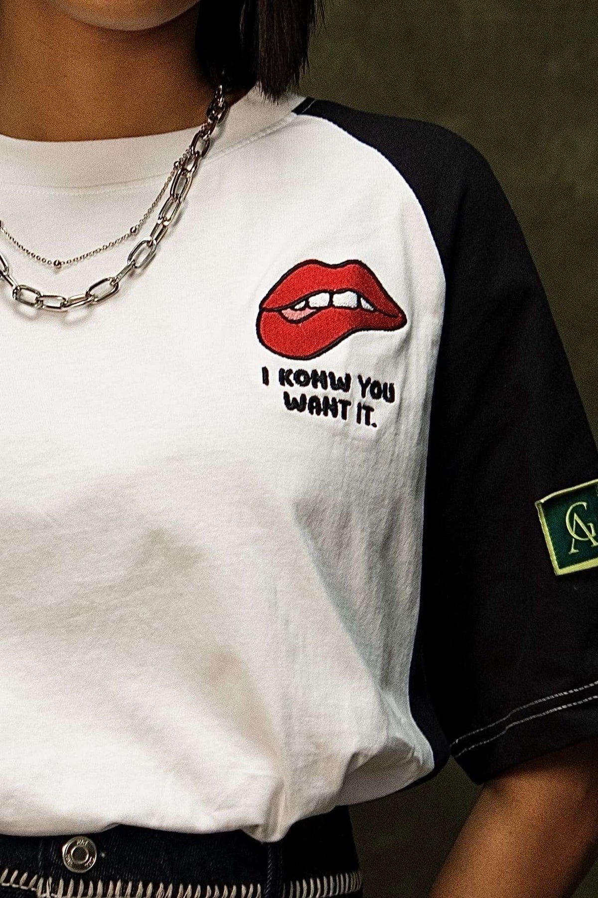 Tease Classic T-shirt (Unisex): close-up of the red lips chest graphic