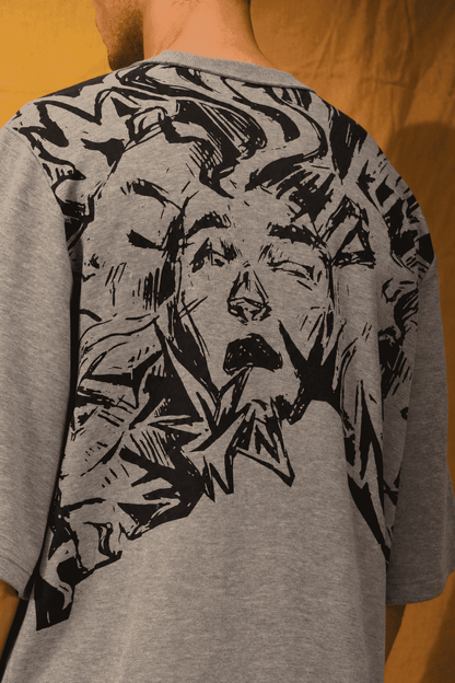 Soul Bound Lounge T-shirt (Unisex): close-up of the abstract face back graphic on a model