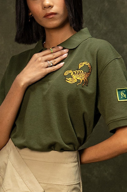 Death Sting Classic Polo (Unisex): close-up of the gold scorpion chest graphic