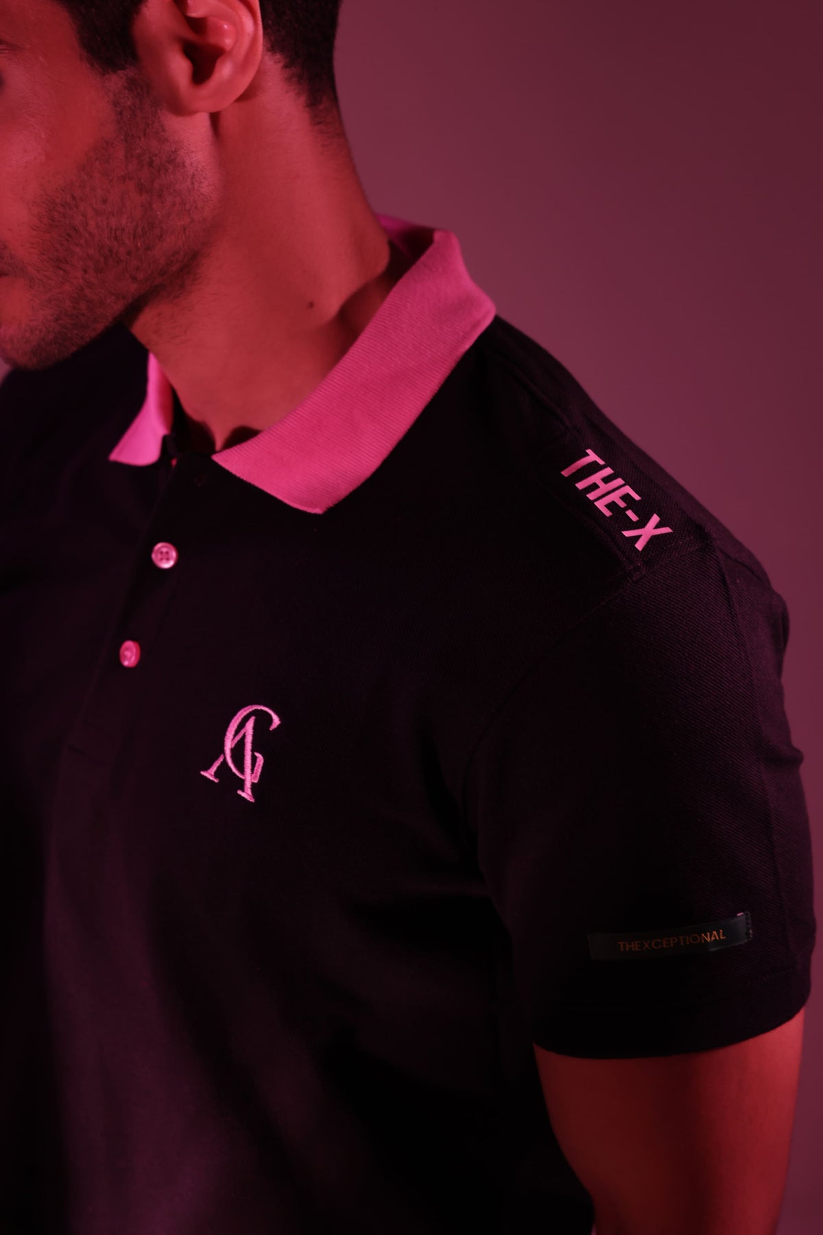 Pink Diamond Classic Polo: close-up of the pink collar and AG chest monogram
