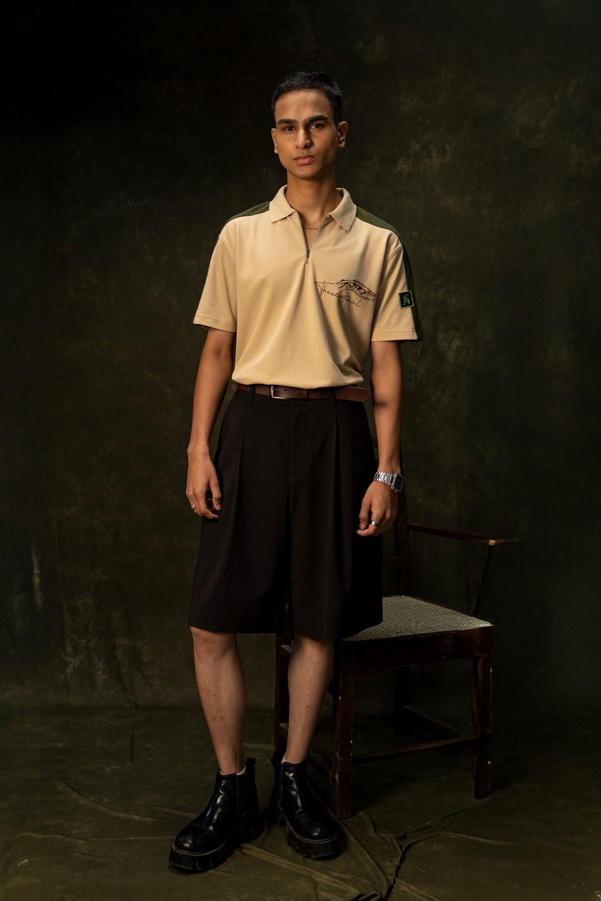 Slither Classic Polo (Unisex): model wearing the beige polo, full-length front view