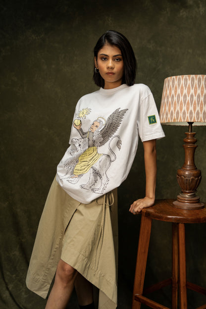 Yellow Apple Classic T-shirt (Unisex): model wearing the white T-shirt with a beige skirt