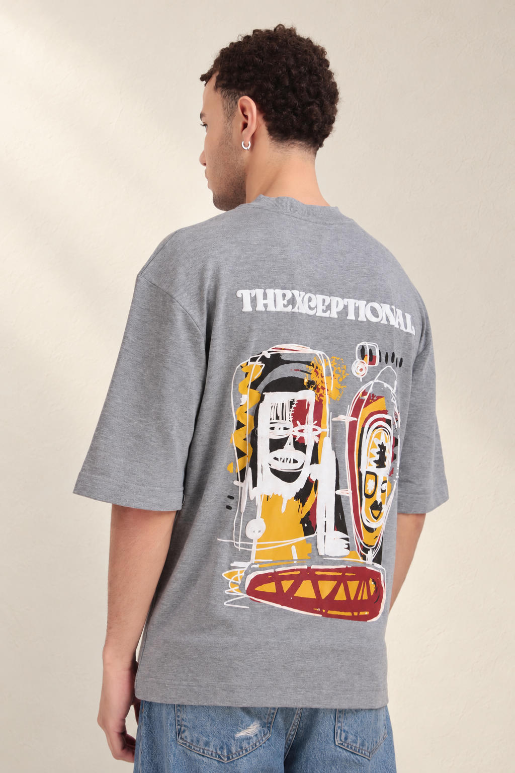 Tribal Masks Lounge T-Shirt: model wearing the grey T-shirt, back view
