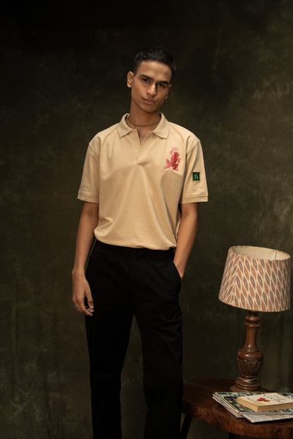 Pink Poison Classic Polo (Unisex): model wearing the beige polo, full-length front view